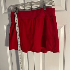 Red Lulu lemon tennis skirt. 6 tall.